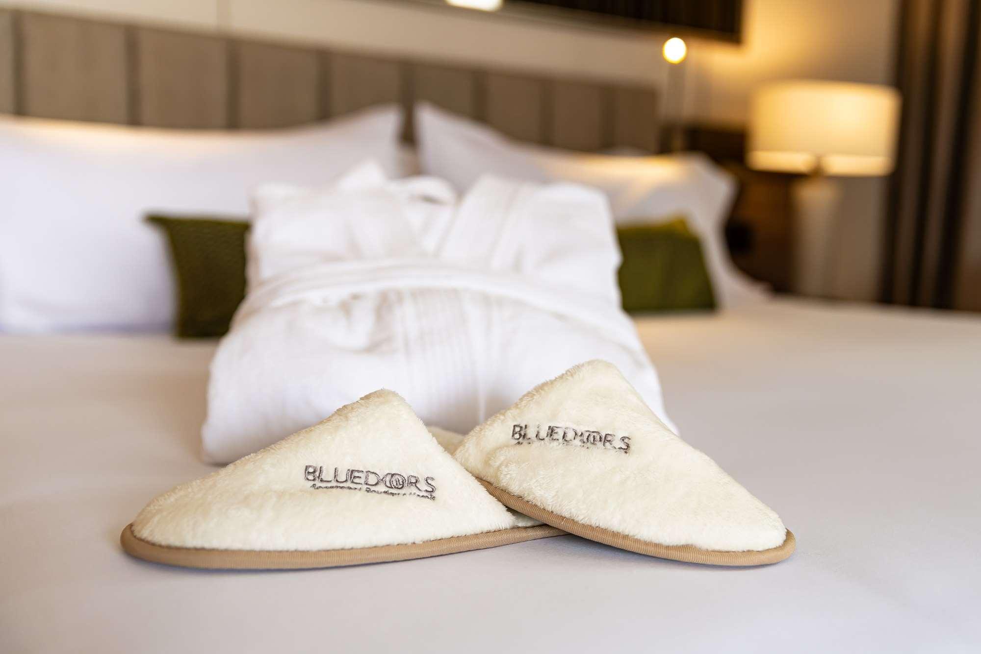 Hotel York Luxury Suites Medellin By Preferred Экстерьер фото A pair of hotel slippers